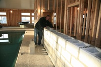 Shane building a cement wall